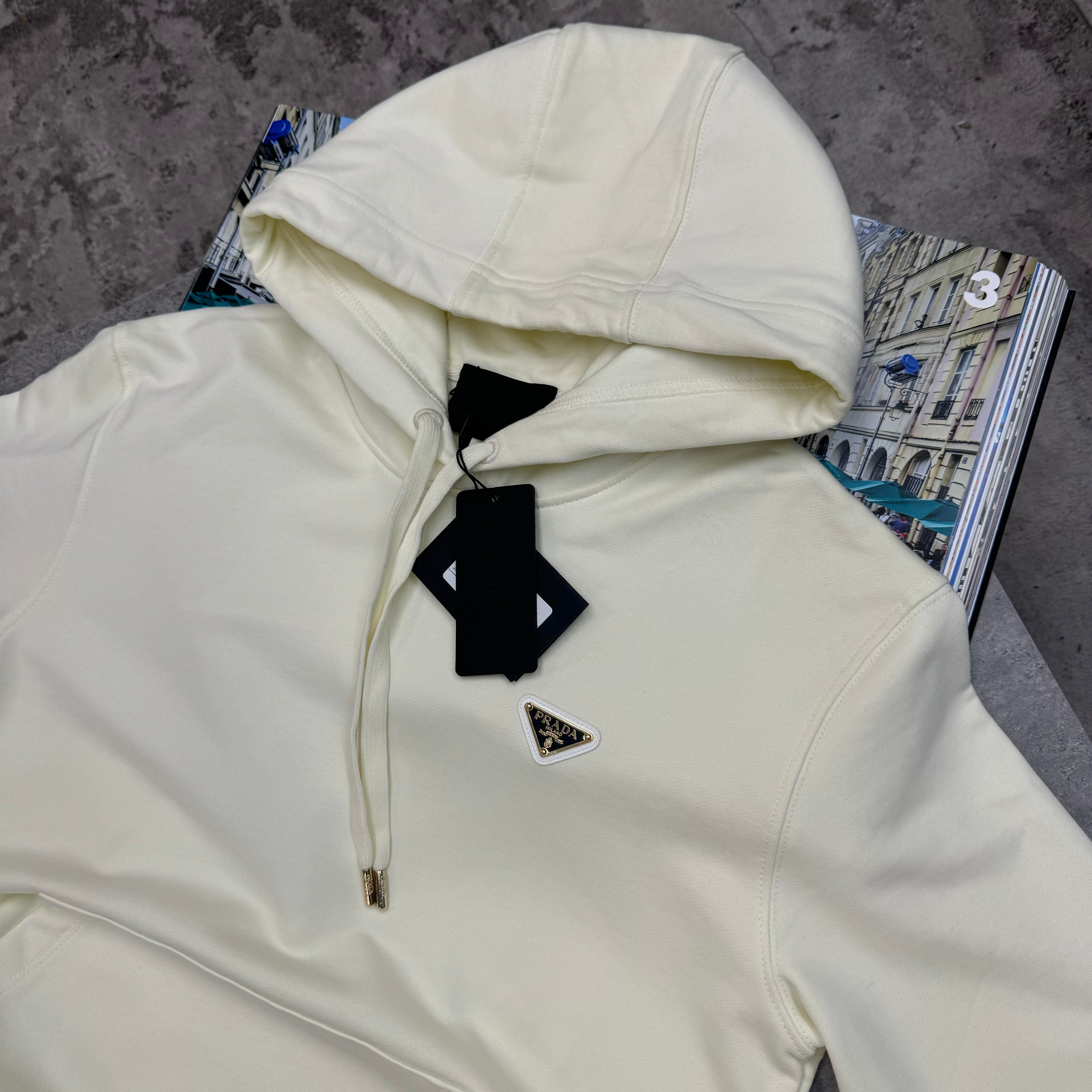 PRADA METAL BADGE HOODIE - OFF WHITE