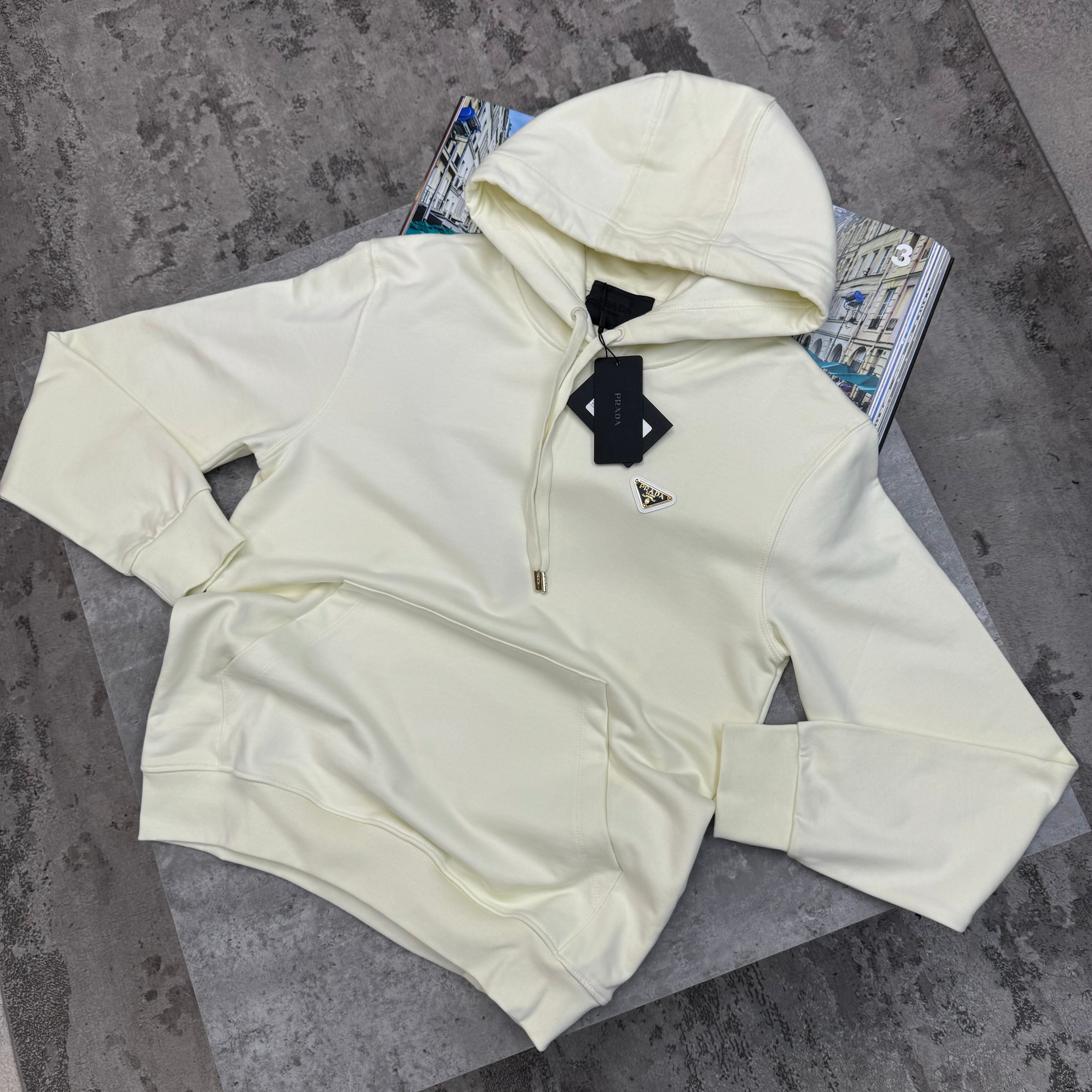 PRADA METAL BADGE HOODIE - OFF WHITE